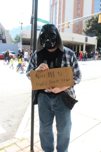 DragonCon is always about fans, and many of them like to produce funny costumes. Here, a down-on-his-luck homeless Darth Vader begs for change for a new Death Star. He was actually making money too!