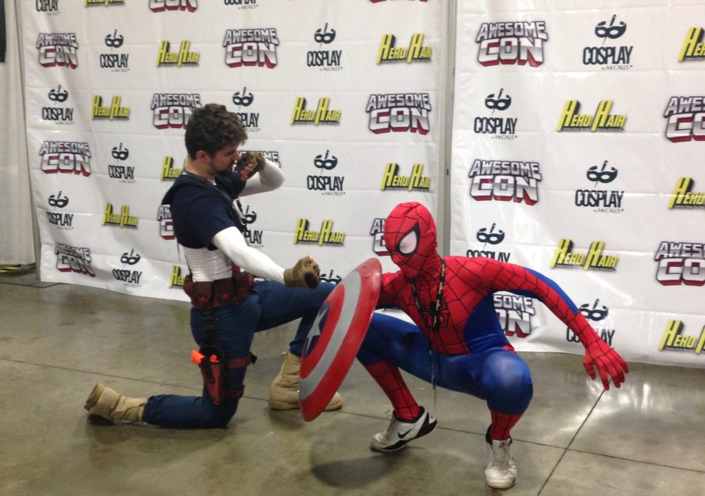 Captain America vs Spiderman from Captain America: Civil War. Cosplayers at the Avengers photo shoot at AwesomeCon 2016.