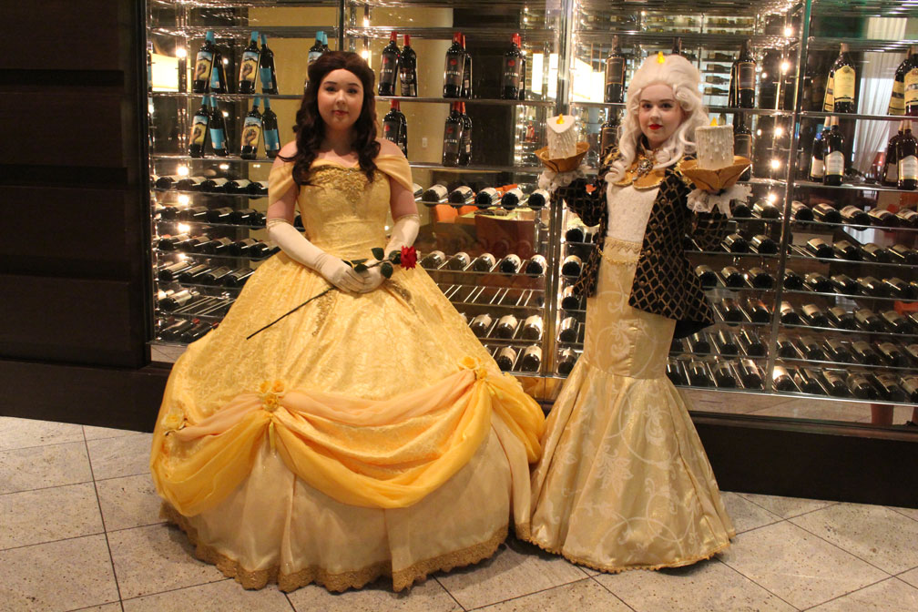 Be our guest! No really, the pleasure is all ours watching Belle and Lumiere from Beauty and the Beast.