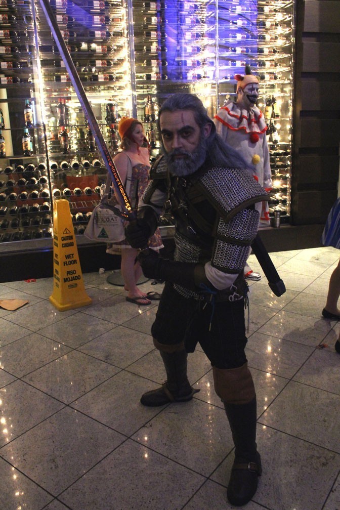 Careful ladies. It's Geralt of Rivia from the Witcher series. His sword even glowed!