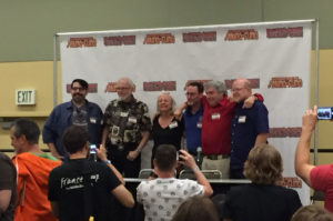 "Story Structure” panelists pose for photos following the event. Left to right: James Tynion IV, Marv Wolfman, Louise Simonson, Robert Greenberger, Elliot S. Maggin, and Mark Waid.