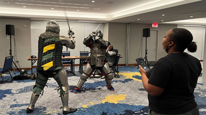 The Knights of Wakanda practice sparring at BLERDCON 2022