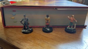 The new Dungeons and Dragons tome towers over my 28-millimeter miniatures!